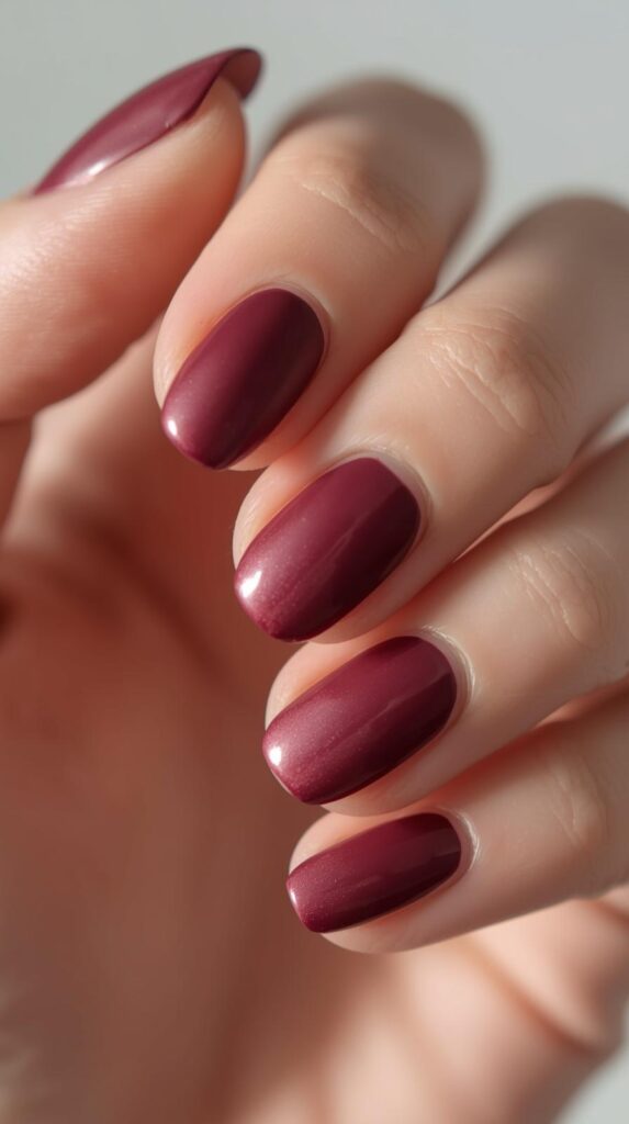 11. Deep Berry Soft Fade Nails