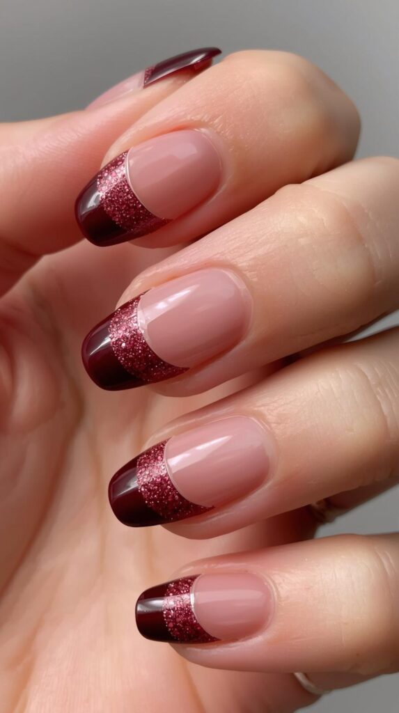 7. Burgundy French Tips with Glitter Edges