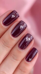 2. Deep Plum Purple Valentine Nails