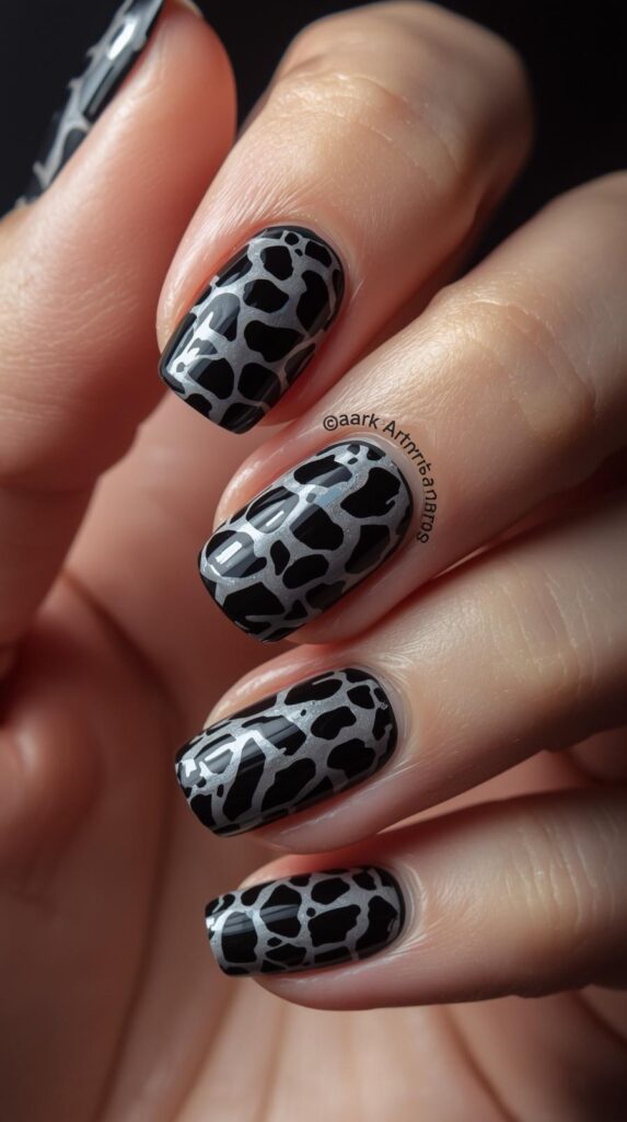 12. Black Animal Print Nails
