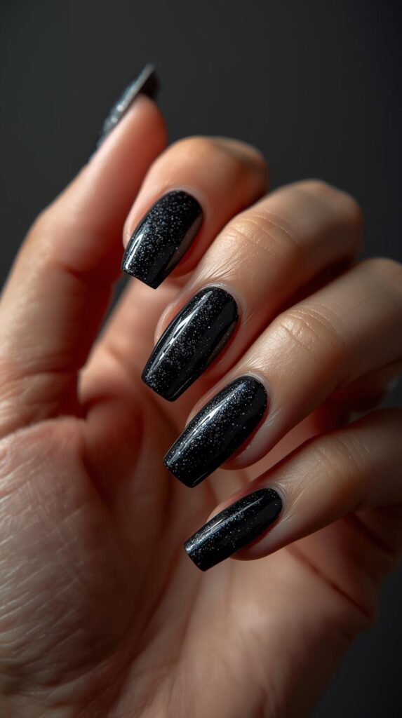 9. Black Glitter Nails