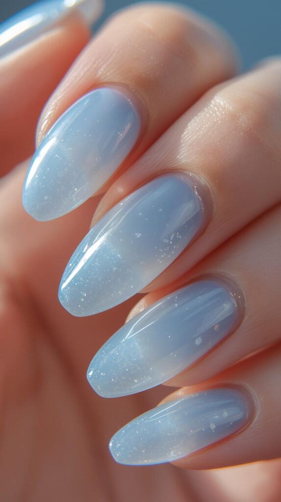 1. Soft Baby Blue Aura Nails Almond