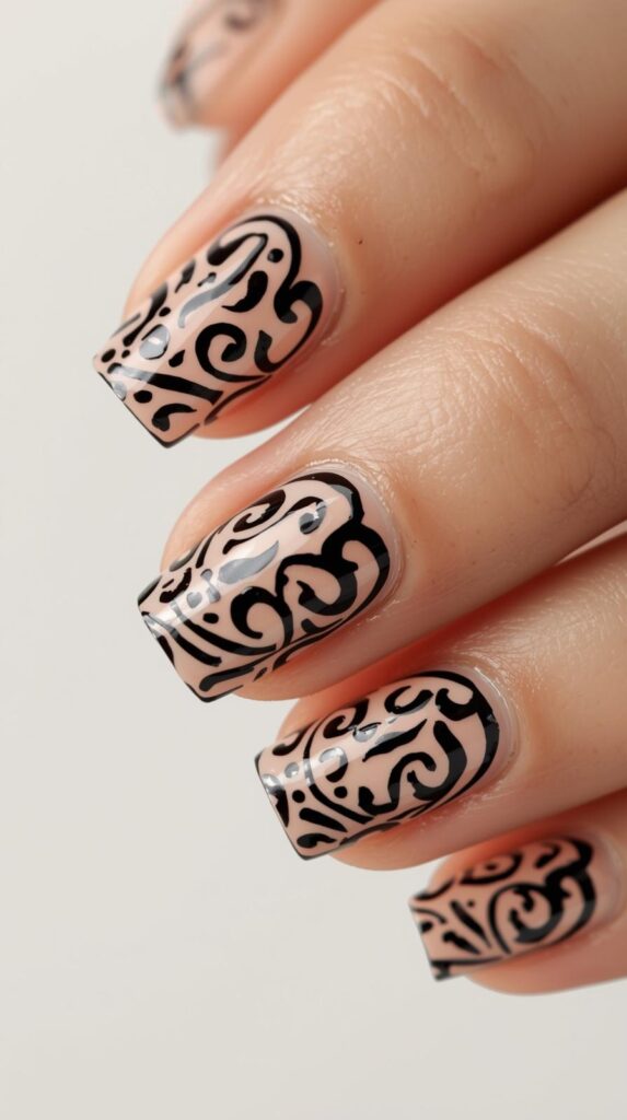 10. Black Swirl Nails