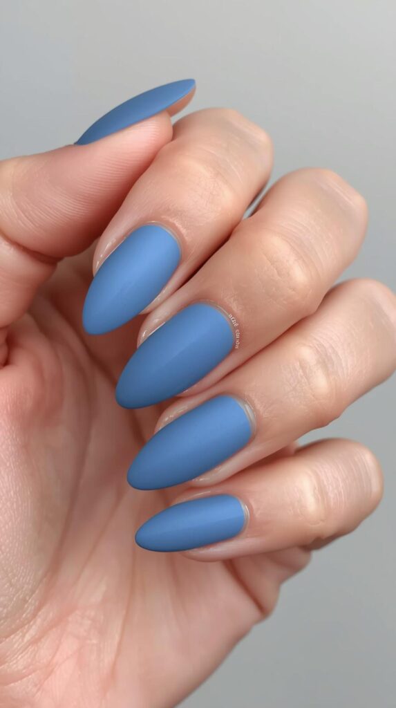 10. Matte Blue Aura Almond Nails
