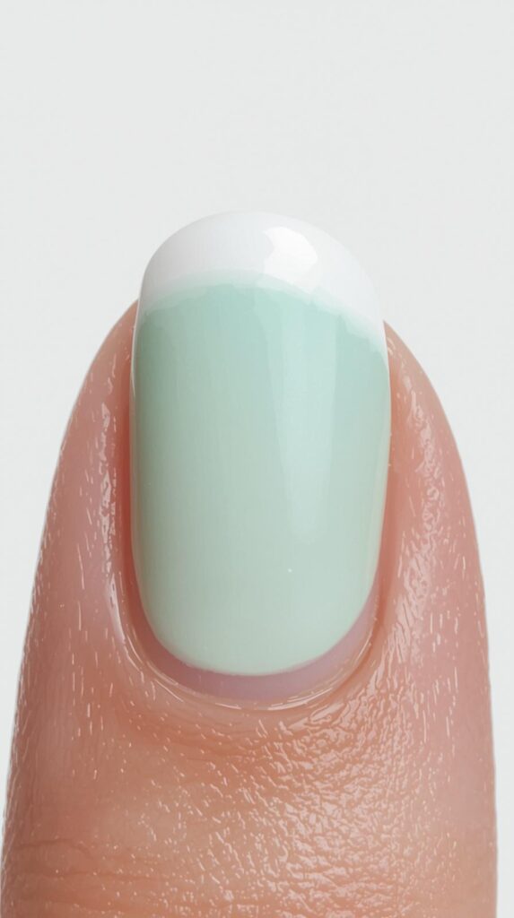 2. Pastel Green French Tips