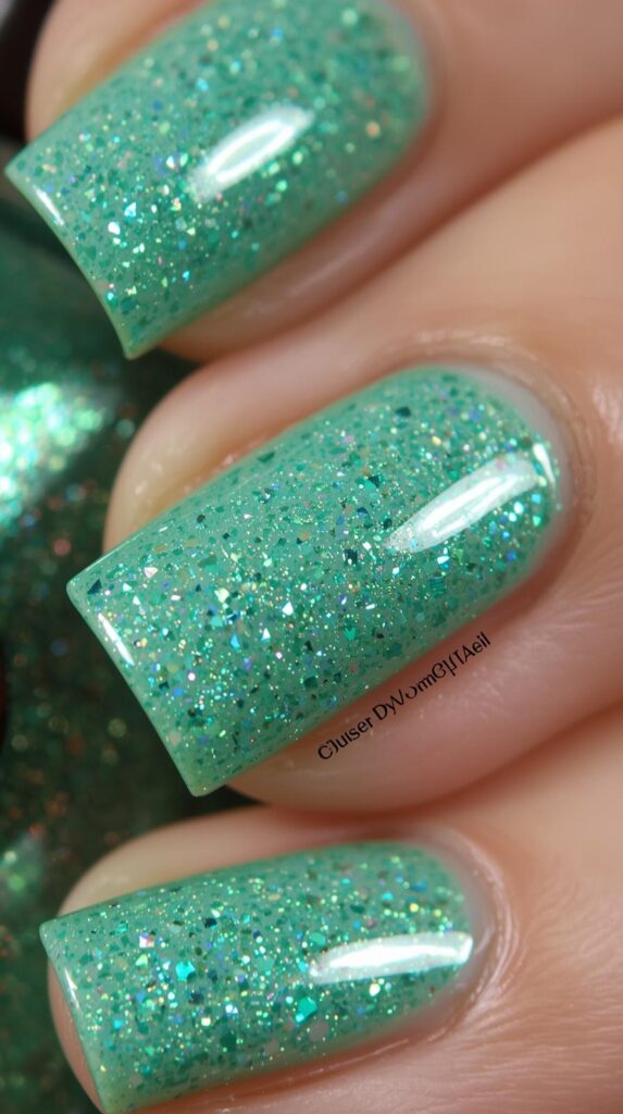 3. Glitter Mint Green Nails