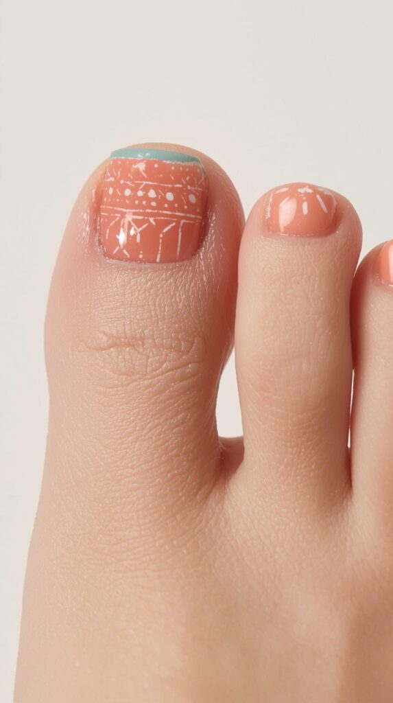 8. Peach Coral and White Geometric Toenails