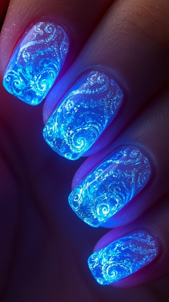 9. Blue Aura Nails White Swirls