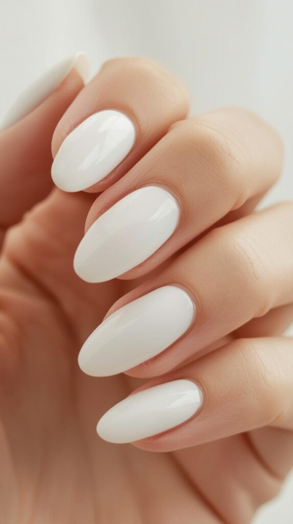 6. Milky White Almond Nails