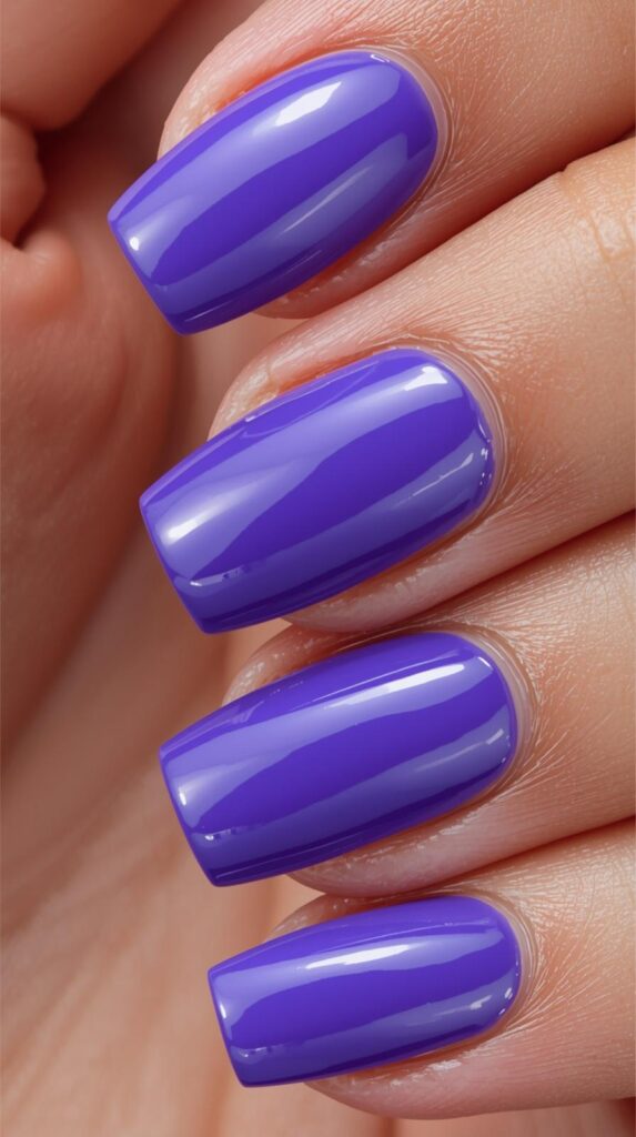 7. Nude Glossy Acrylic Nails