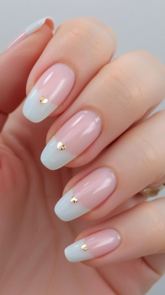 8. Tiny Heart Accent Nails