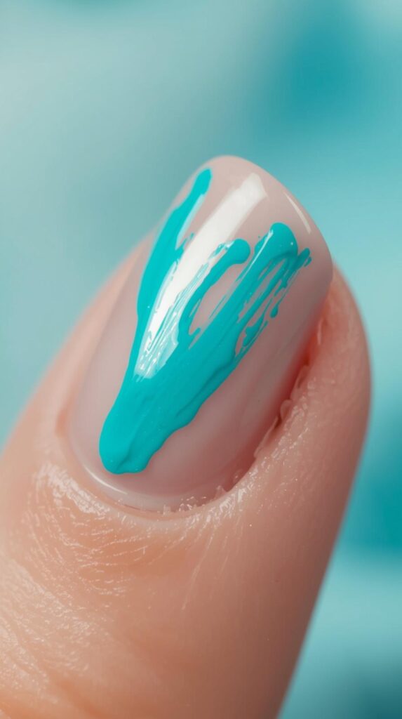 9. Turquoise Splash Nail