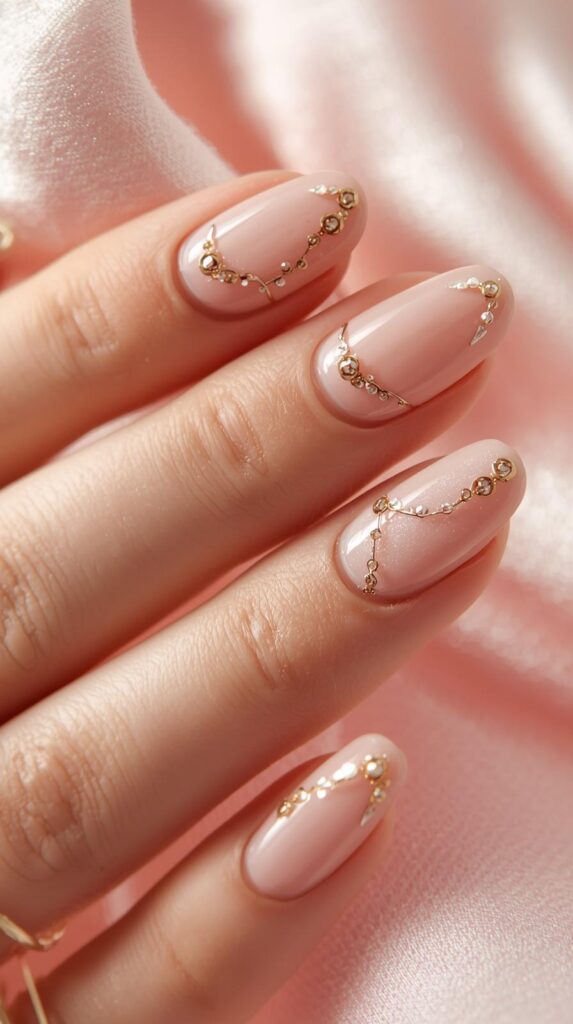 10. Delicate Gold Accent Nails